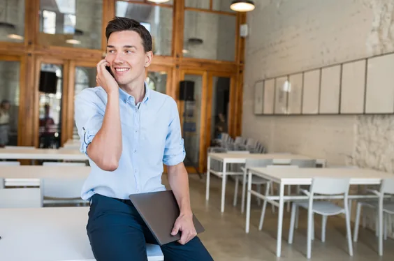 Freelancer on the phone in a coworking space